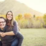 A happy couple in the mountains.