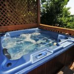 A hot tub on the deck of a cabin in Gatlinburg.