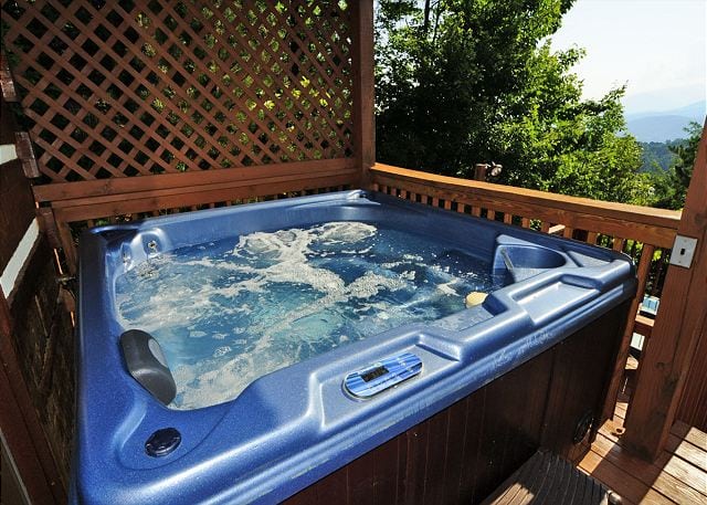 A hot tub on the deck of a cabin in Gatlinburg.
