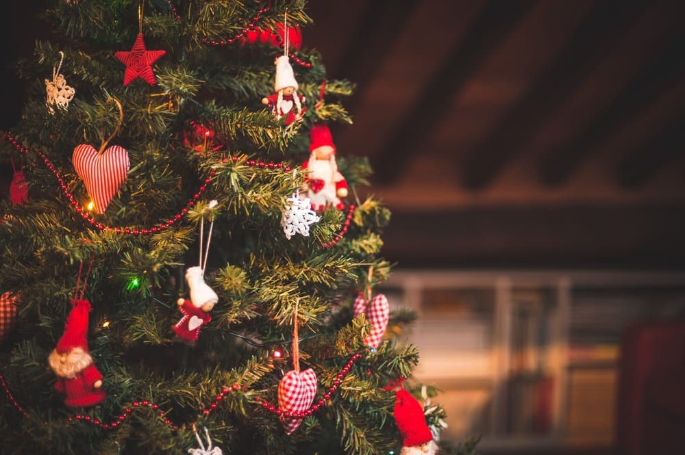 decorated christmas tree in cabin