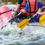 people white water rafting in the smoky mountains