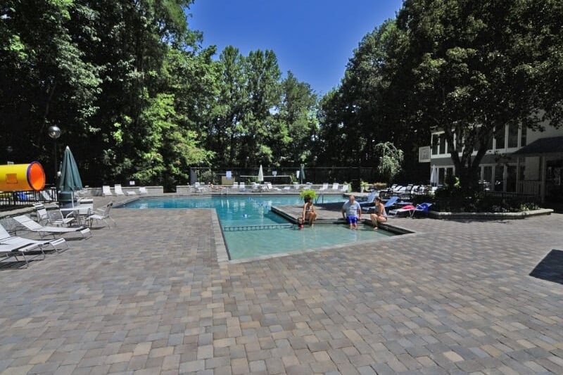 Guests enjoying the South Baden Clubhouse pool at Chalet Village.